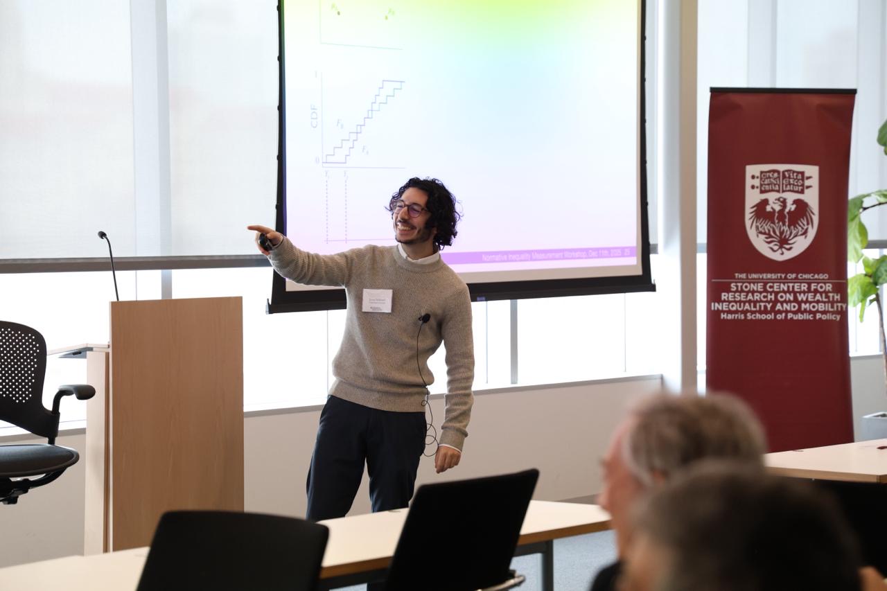 Jonas Mikhaeil speaking at a research presentation